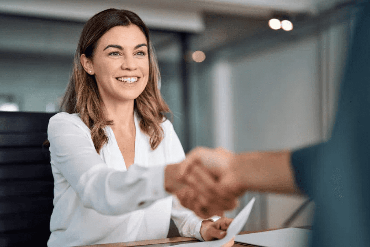 a woman shaking hands